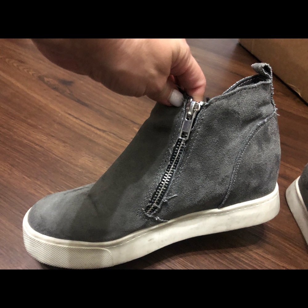 Super cute gray high top sneakers. Worn once and super comfortable.